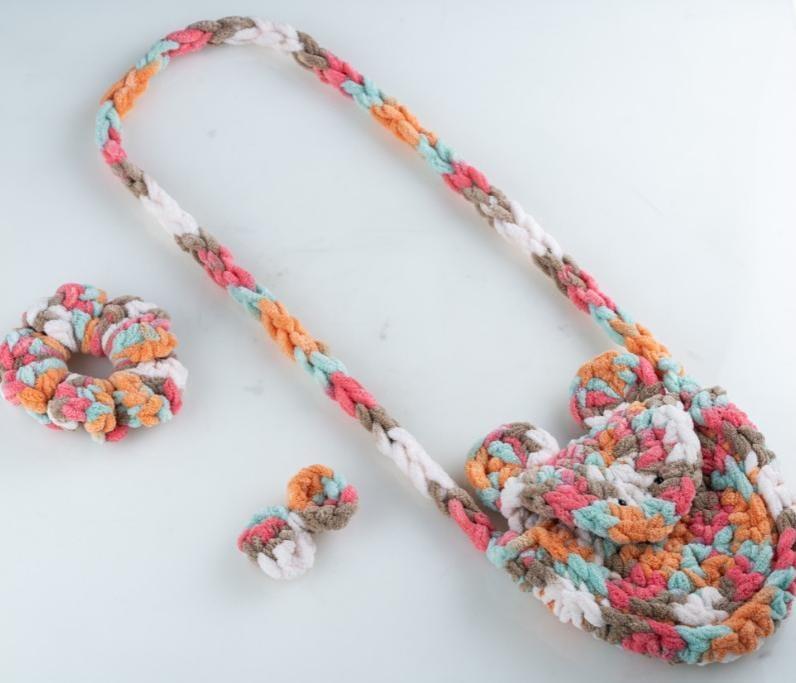 Handmade multicolored braided fabric bag and accessories.