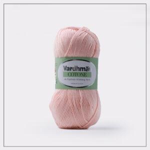 Pink Vardhman cotton knitting yarn skein.